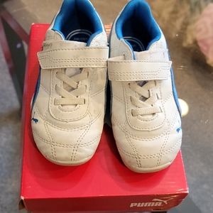 Boys blue and white soccer shoes